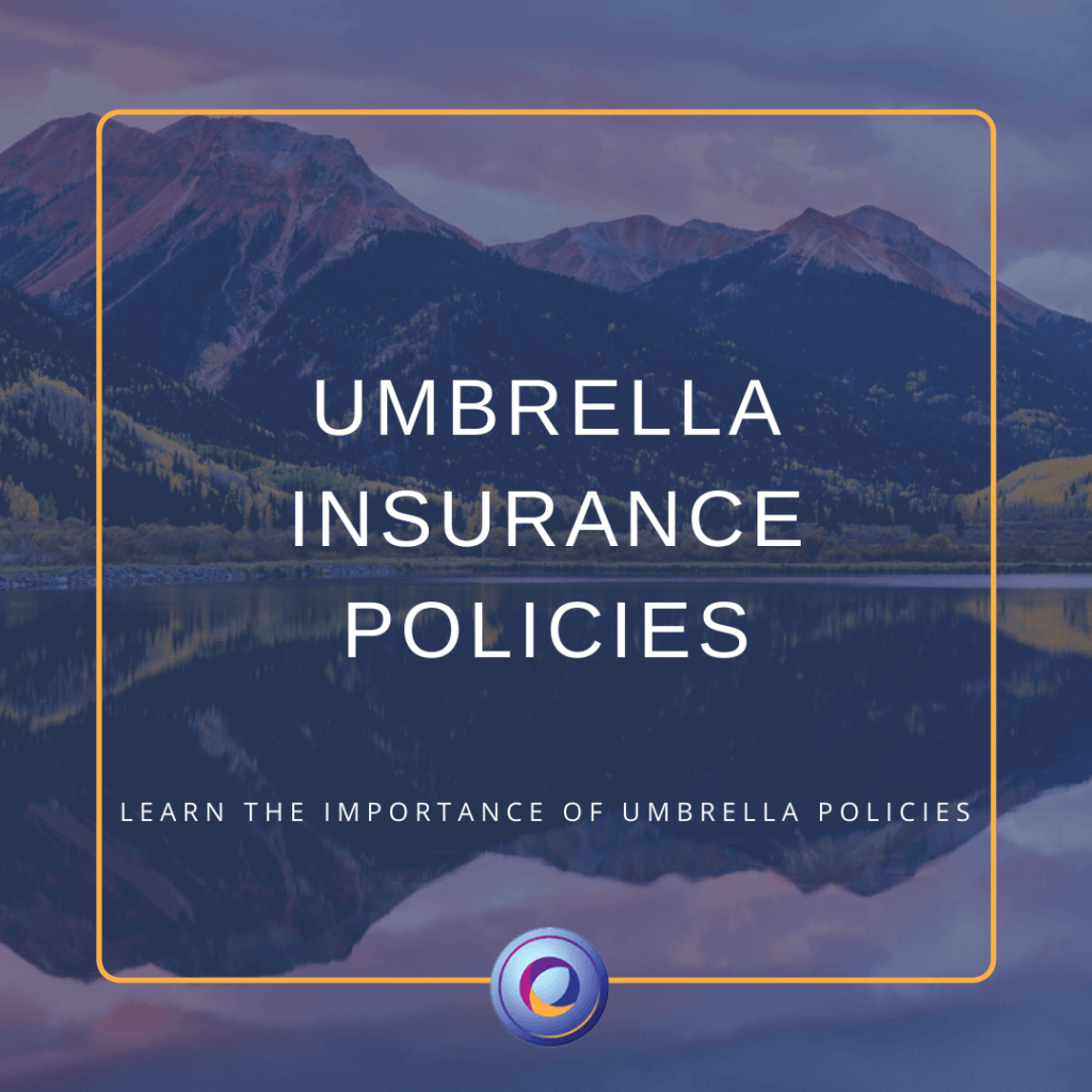 The graphic background is an image of Colorado mountains and in the center of the graphic is the title of the blog which reads, "Umbrella Insurance Policies."